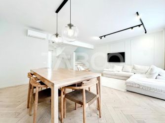 Apartament cu 4 camere cu gradina in vila de vanzare parcare Borhanci