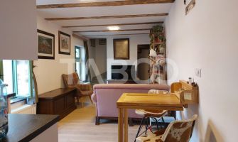 Apartament de vanzare 105 mp 3 camere curte 340 mp in acte Cisnadie