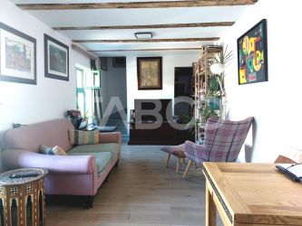 Apartament de vanzare 105 mp 3 camere curte 340 mp in acte Cisnadie