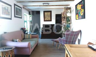 Apartament de vanzare 105 mp 3 camere curte 340 mp in acte Cisnadie