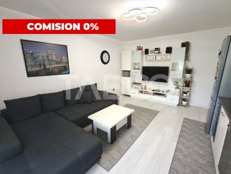 Apartament decomantat 3 camere 2 bai 70 mp utili cu parcare subterana