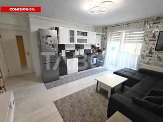 Apartament decomantat 3 camere 2 bai 70 mp utili cu parcare subterana