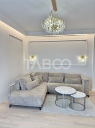 Apartament ultrafinisat tip penthouse de vanzare cu 3 camere Floresti