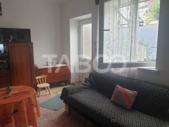 Casa 2 camere 60 mp utili pivniță anexe curte gradina Sebes Alba 