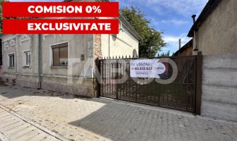 Casa cu potential de investitie in centrul satului 1540 mp teren 