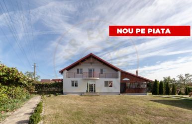 Casa cu teren generos si gradina spectaculoasa – Comuna Cuca, Argeș