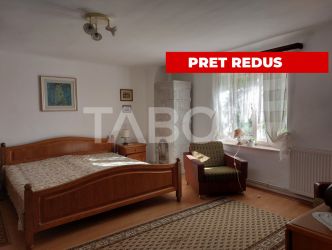 Casa de vanzare cu 2 apartamente separate si teren 500 mp Cisnadioara
