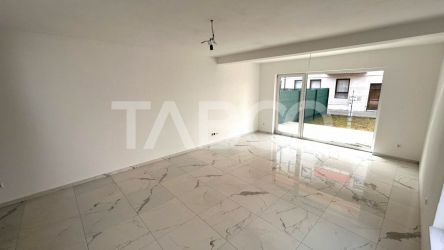Casa de vanzare cu 4 camere 121 mpu 2 locuri de parcare curte in Sibiu