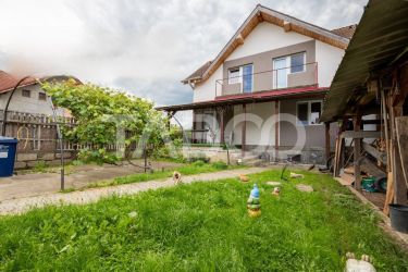 Casa de vanzare cu 4 dormitoare 2 bai si pivinita in Selimbar