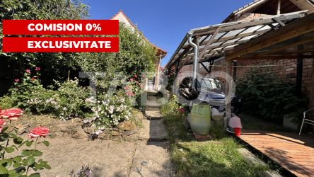 Casa de vanzare cu curte spatioasa loc relaxare si gradina Cornatel 