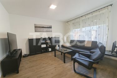 Casa de vanzare in Zavoi cu 3 camere 2 bai curte libera de 50 mp