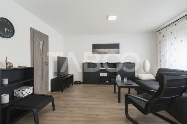 Casa de vanzare in Zavoi cu 3 camere 2 bai curte libera de 50 mp