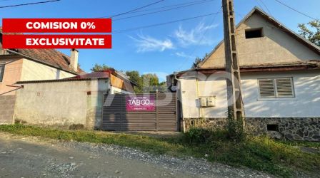 Casa individuala COMISION 0% din 2 corpuri curte 900mp in Cisnadioara 