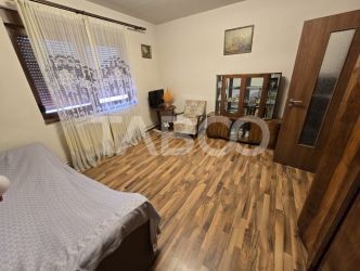 Casa individuala de vanzare 4 camere garaj curte 1310 mp Gusterita
