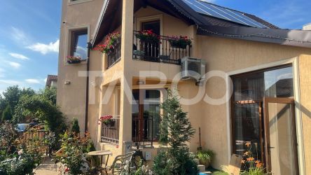 Casa individuala de vanzare cu garaj gradina si panouri fotovoltaice