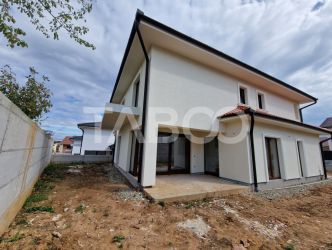 Casa individuala de vanzare cu teren, terasa, garaj si curte Selimbar