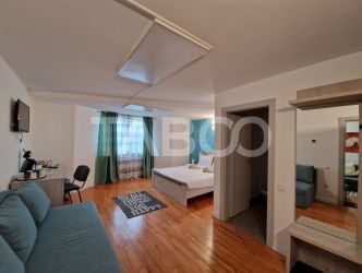Casa insiruita cu 4 nivele avand etajele in regim hotelier Strand