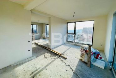 De vanzare duplex semifinisat cu 2 garaje in cartierul Dambul Rotund