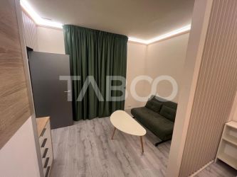 Garsoniera de inchiriat cu curte zona Centrala 2 parcari