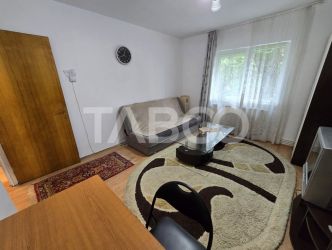 Garsoniera decomandata de vanzare mobilata pivnita Vasile Aaron Sibiu
