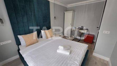 Pensiune de vanzare cu 8 unitati de locuit si filigorie zona Turnisor