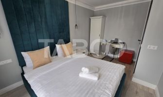 Pensiune de vanzare cu 8 unitati de locuit si filigorie zona Turnisor