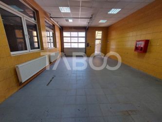 Spatiu comercial de inchiriat 50 mpu usa culisanta parcare Sibiu