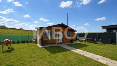 Teren de vanzare 500 mp + cabana la cheie cu utilitati Sura Mare