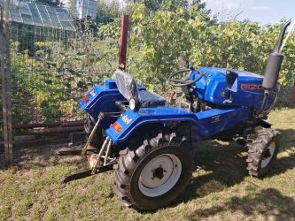 Vand Tractor BizonT20 4x4 + plug 2cormane si freza1,25m pret 21.000lei